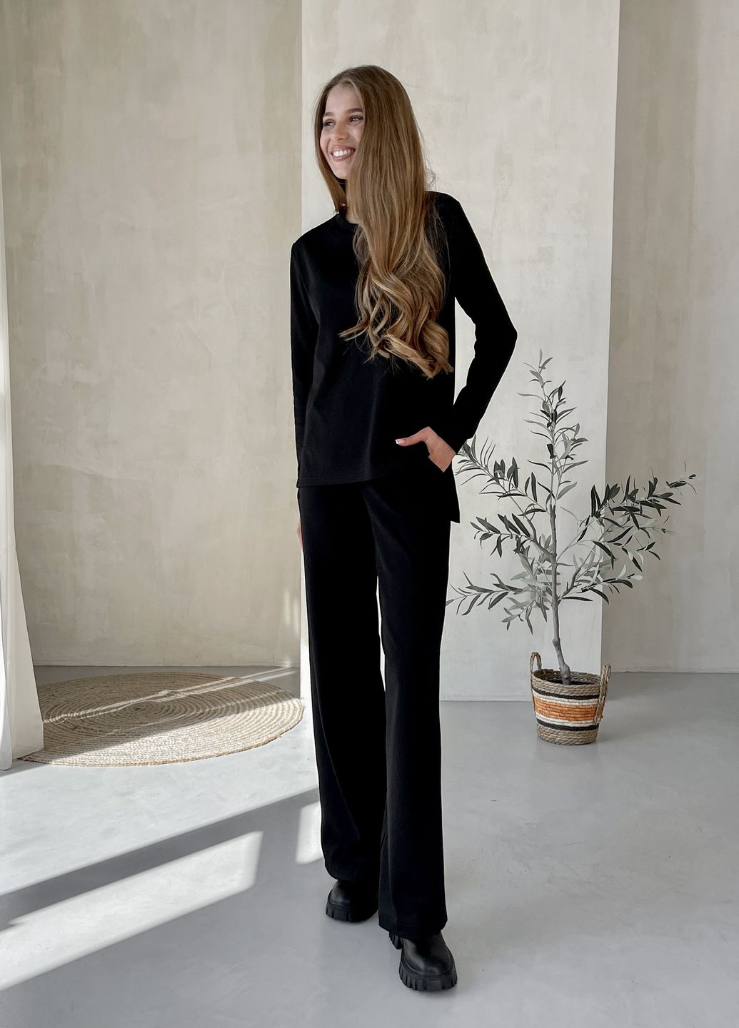 Купить Теплый костюм в рубчик с широкими штанами на флисе черный Merlini Ланс 100001141 размер 42-44 в интернет-магазине