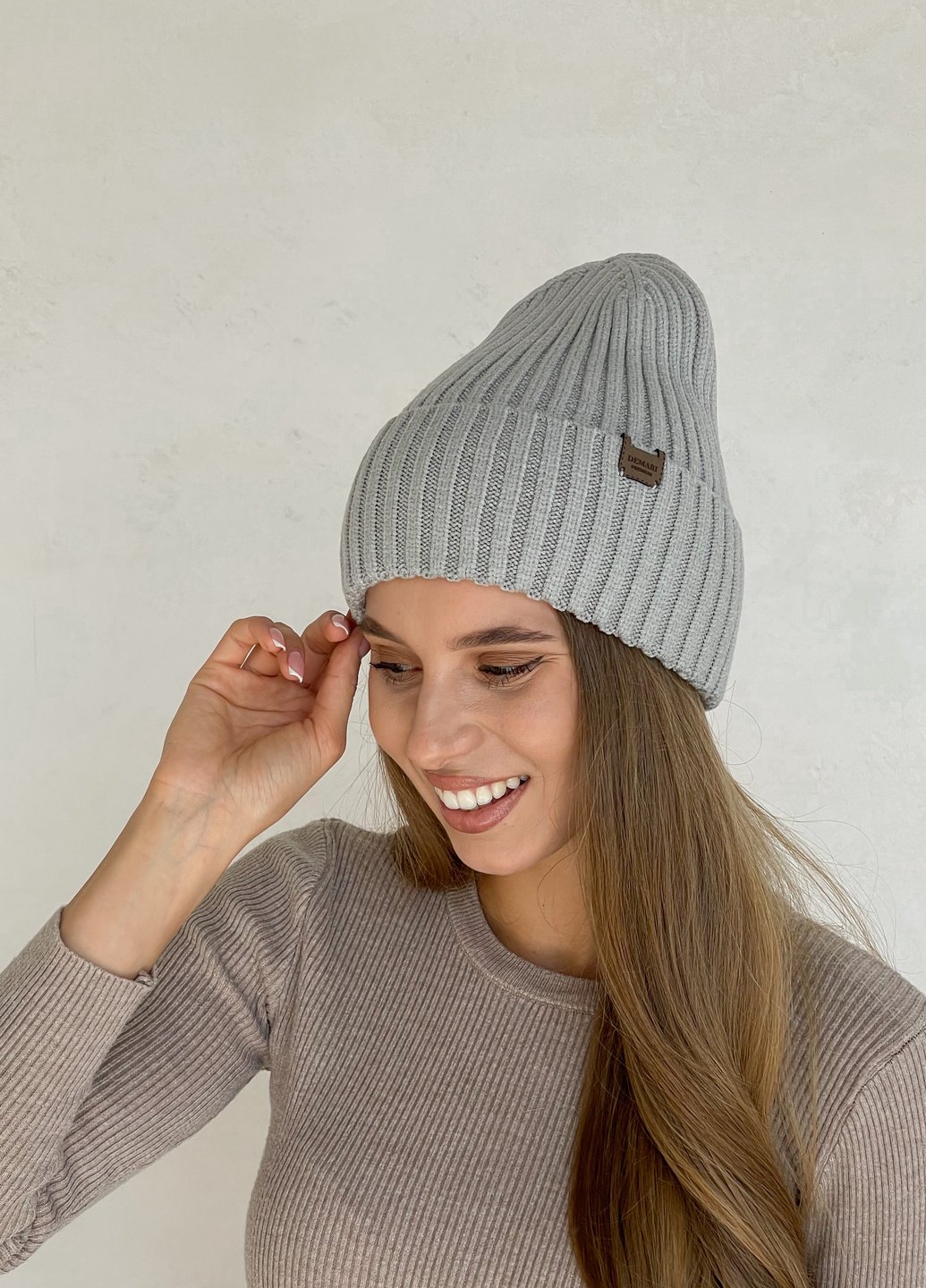 Купити Тепла зимова кашемірова жіноча шапка з відворотом на флісовій підкладці DeMari 500120 в інтернет-магазині